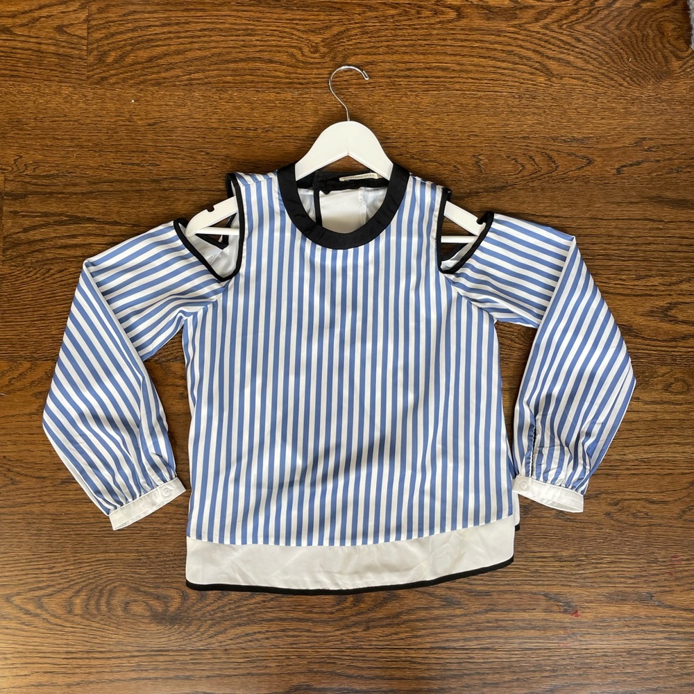 Blue and white flowy blouse with open back and cutouts